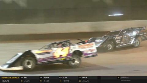 Chris Madden passes Scott Bloomquist for the win at the Colossal 100
