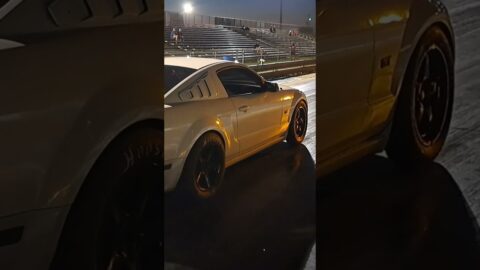 Ford Mustang GT with nitrous drag racing.