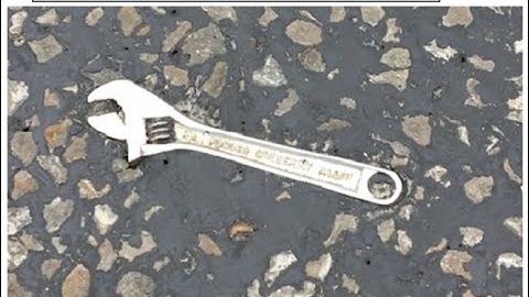 The tool you can't have. Road-kill wrench, stuck in the Asphalt.