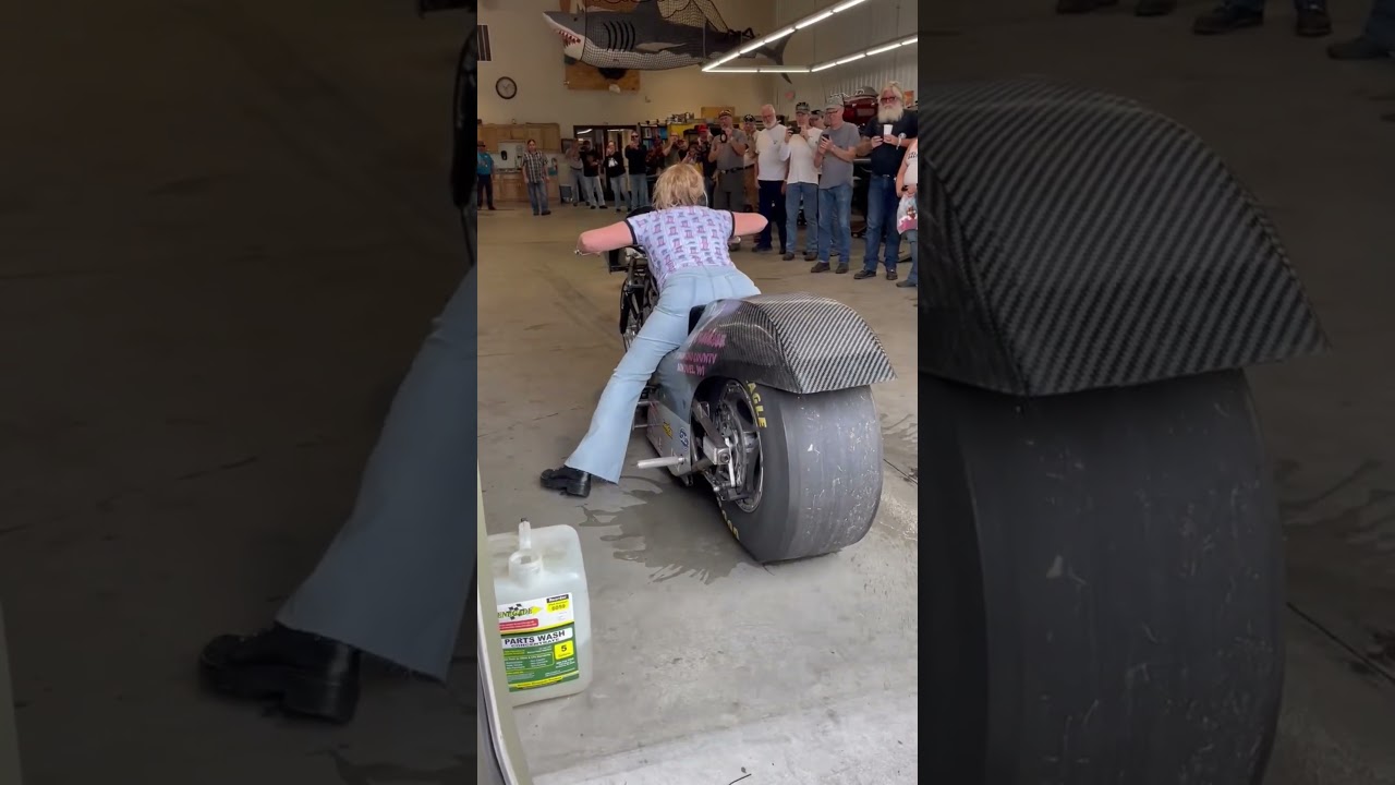 Girl burnout on her drag bike